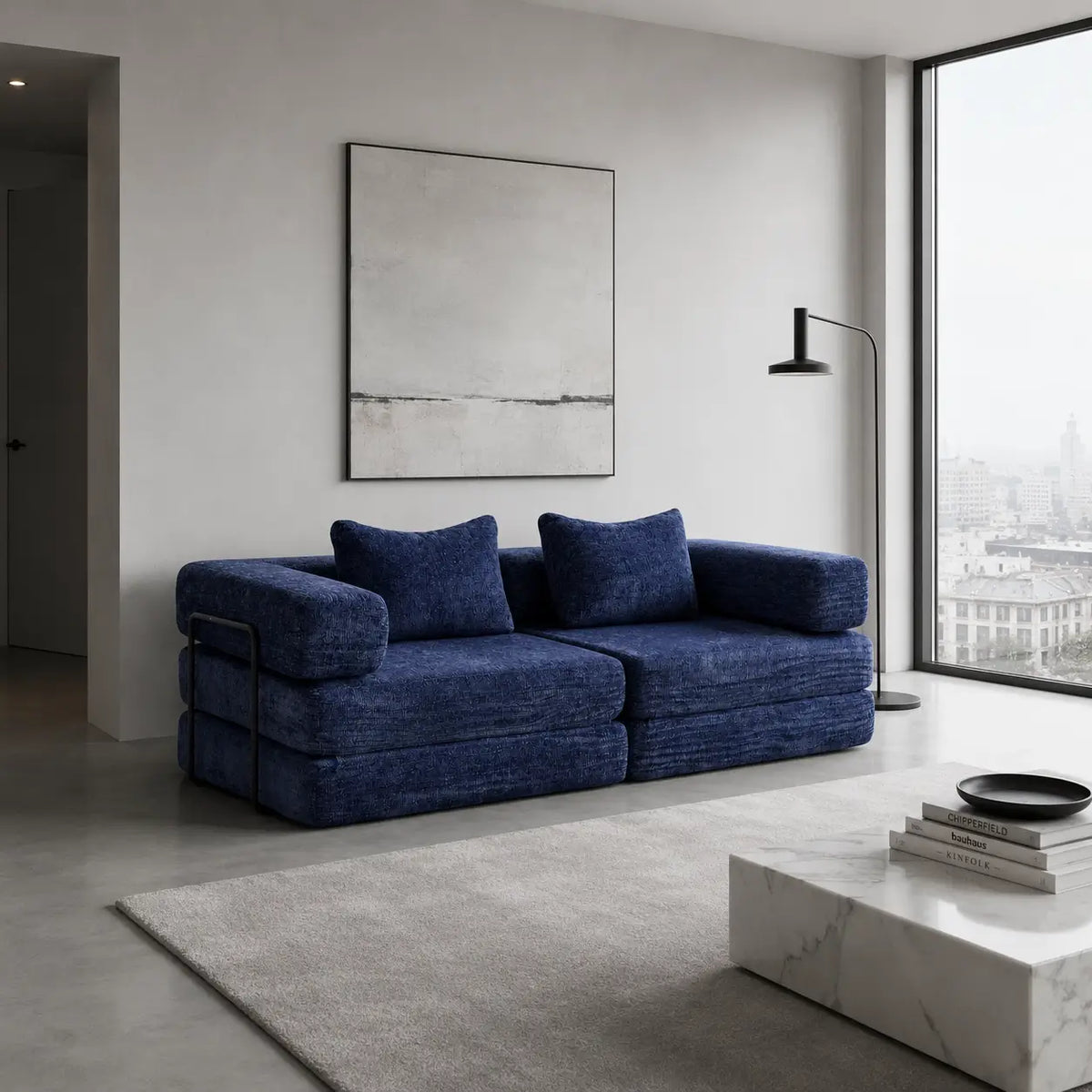 Canapé-lit modulable Kovena Duo bleu marine dans un intérieur décoré